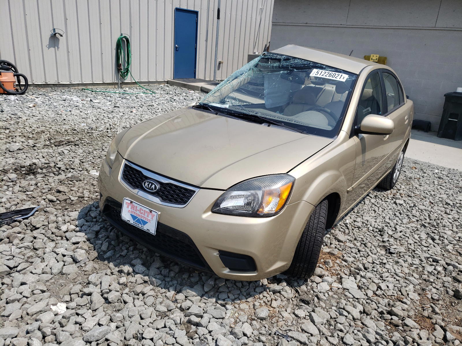 Photo 2 from auction – 2011 KIA RIO BASE with VIN KNADH4A35B6930614