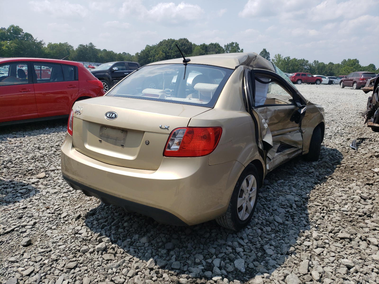 Photo 4 from auction – 2011 KIA RIO BASE with VIN KNADH4A35B6930614