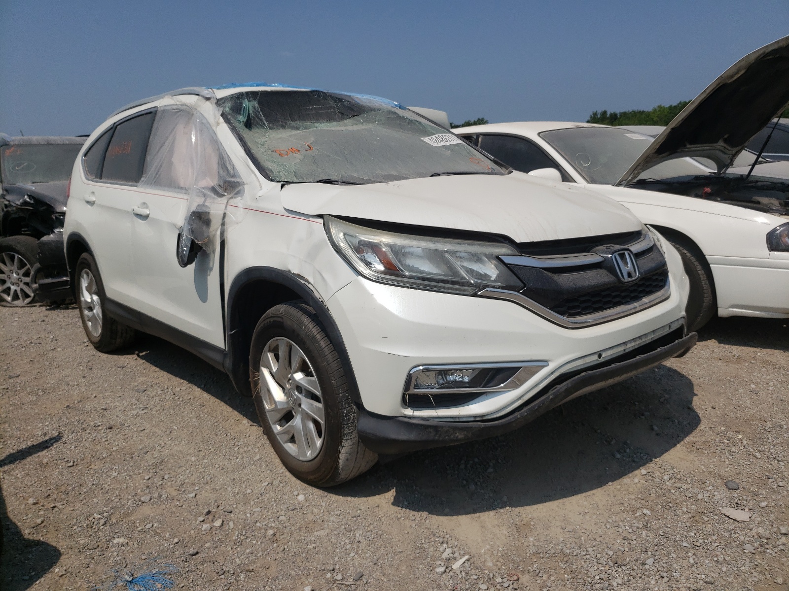 Photo 1 from auction – 2015 HONDA CR-V EXL with VIN 5J6RM4H75FL028804