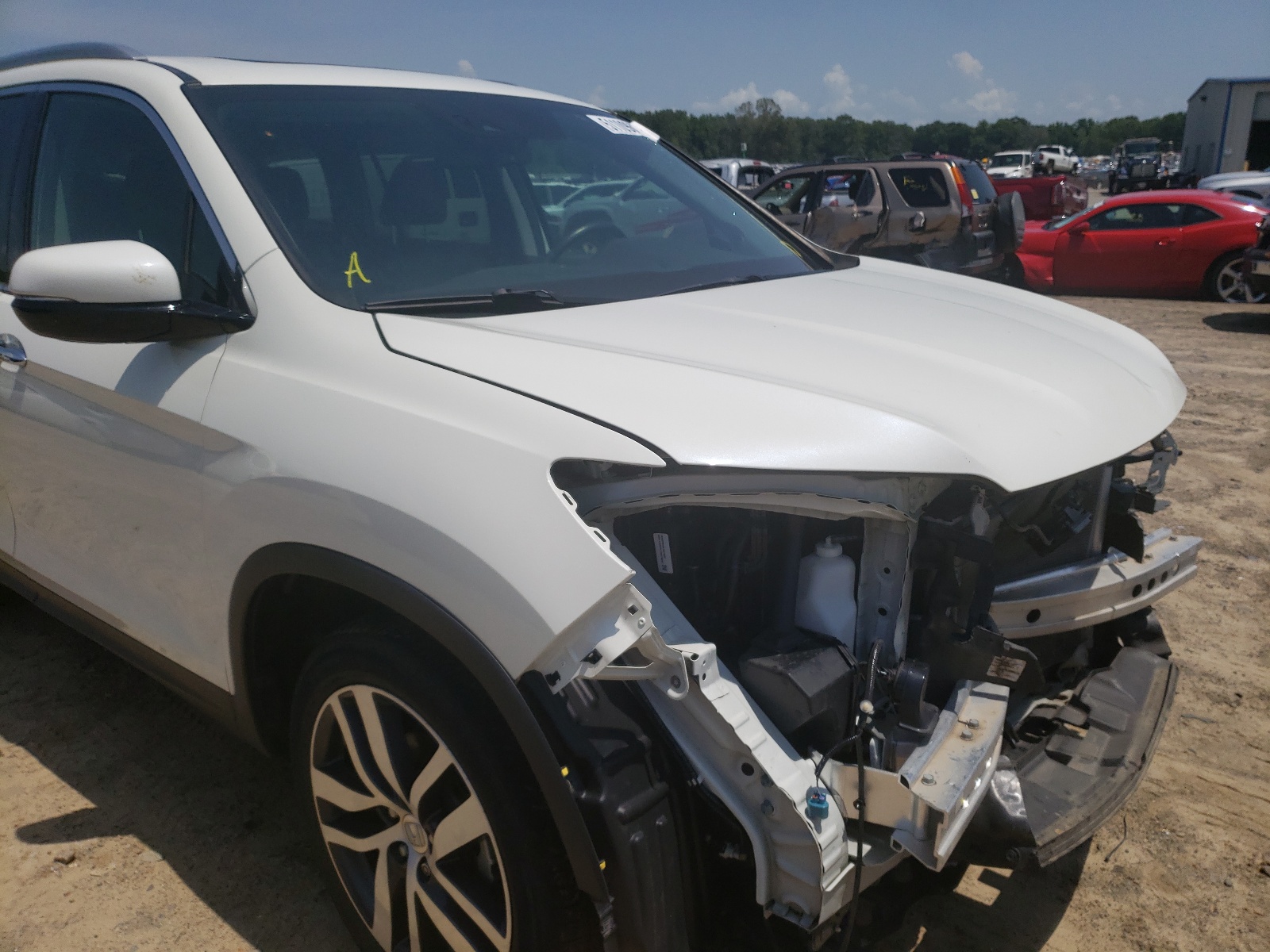 Photo 9 from auction – 2017 HONDA PILOT ELIT with VIN 5FNYF6H01HB045874