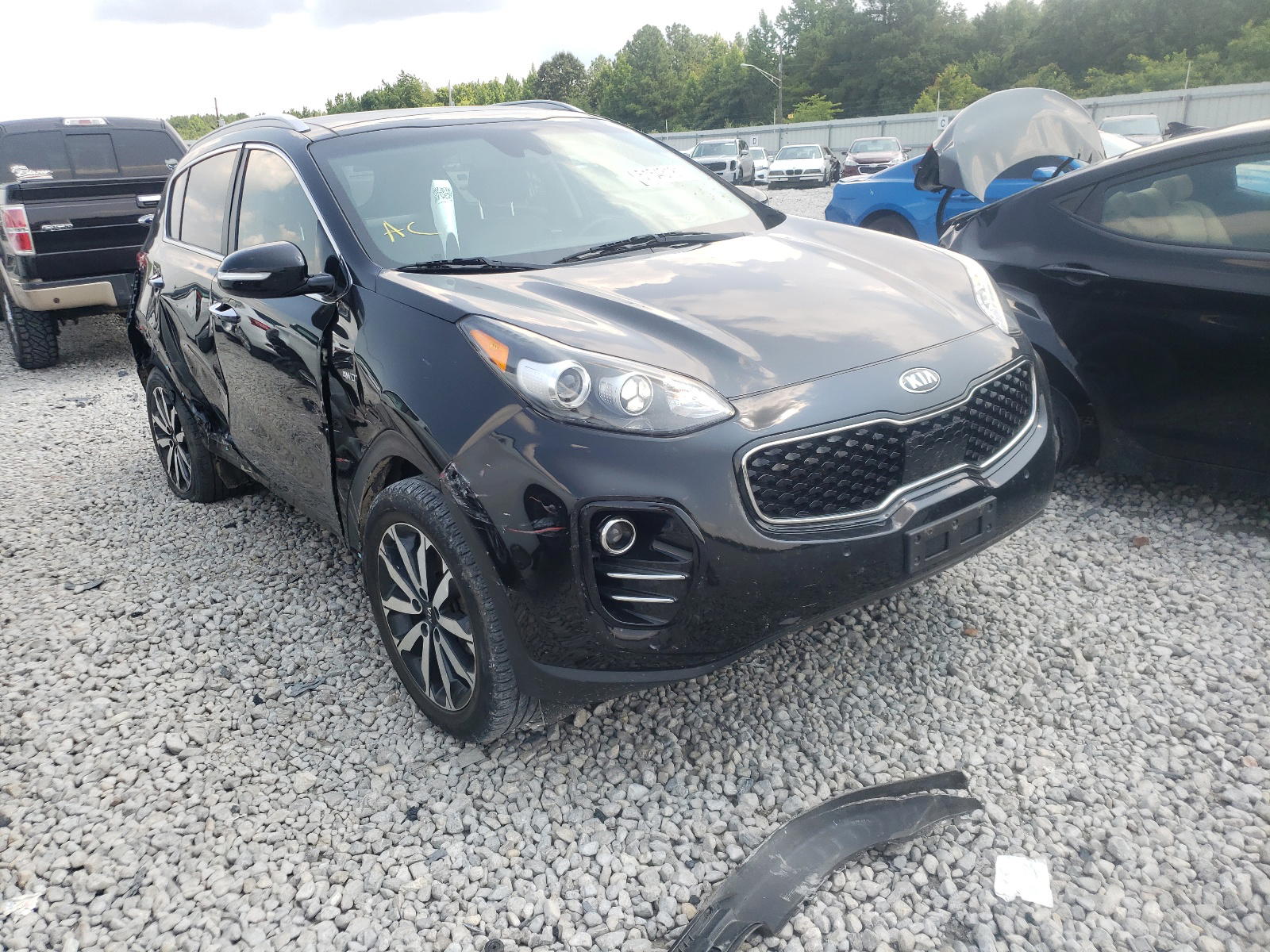 KIA SPORTAGE E 2017 with VIN KNDPNCAC8H7125910 - Photo from auction