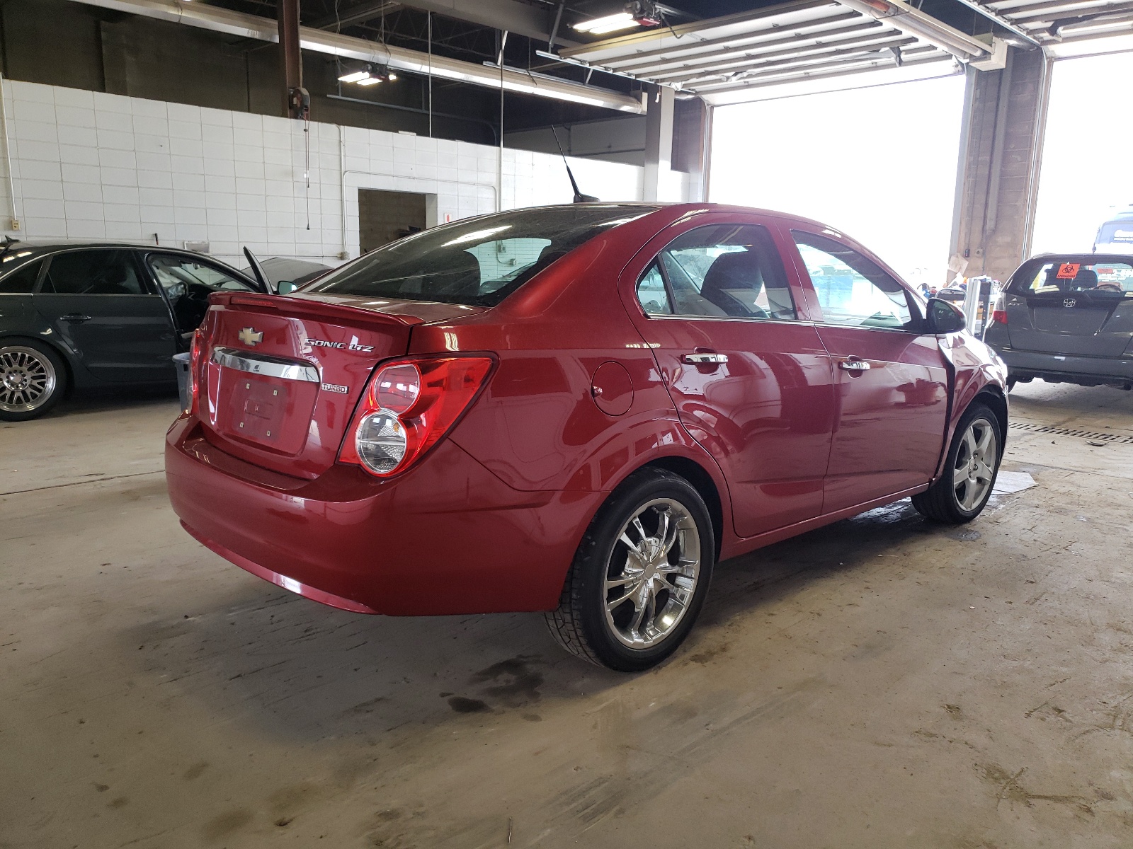 Photo 4 from auction – 2013 CHEVROLET SONIC LTZ with VIN 1G1JE5SB5D4180164