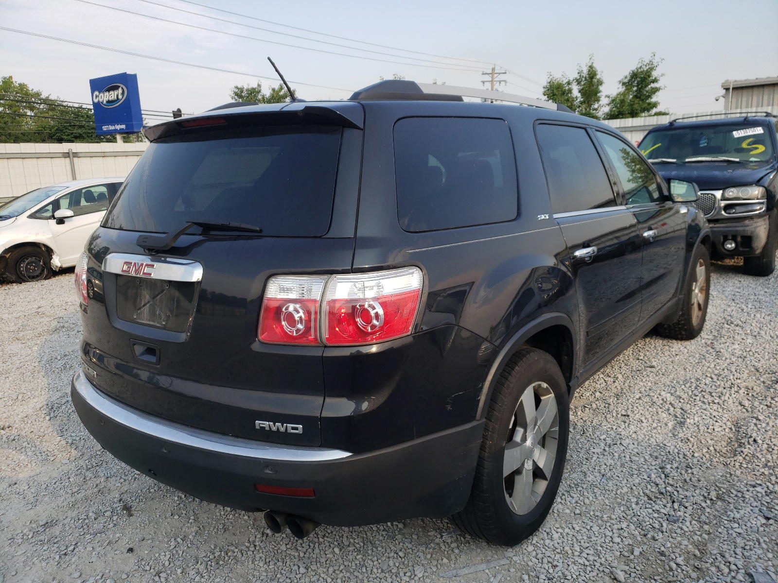 Photo 4 from auction – 2011 GMC ACADIA SLT with VIN 1GKKVRED7BJ242019