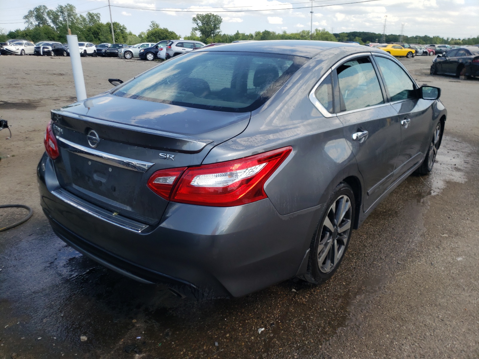 Photo 4 from auction – 2016 NISSAN ALTIMA 2.5 with VIN 1N4AL3APXGC178005