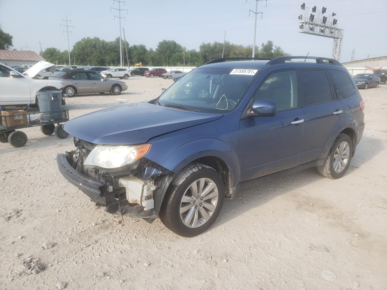 Photo 2 from auction – 2011 SUBARU FORESTER L with VIN JF2SHBFC7BH719606