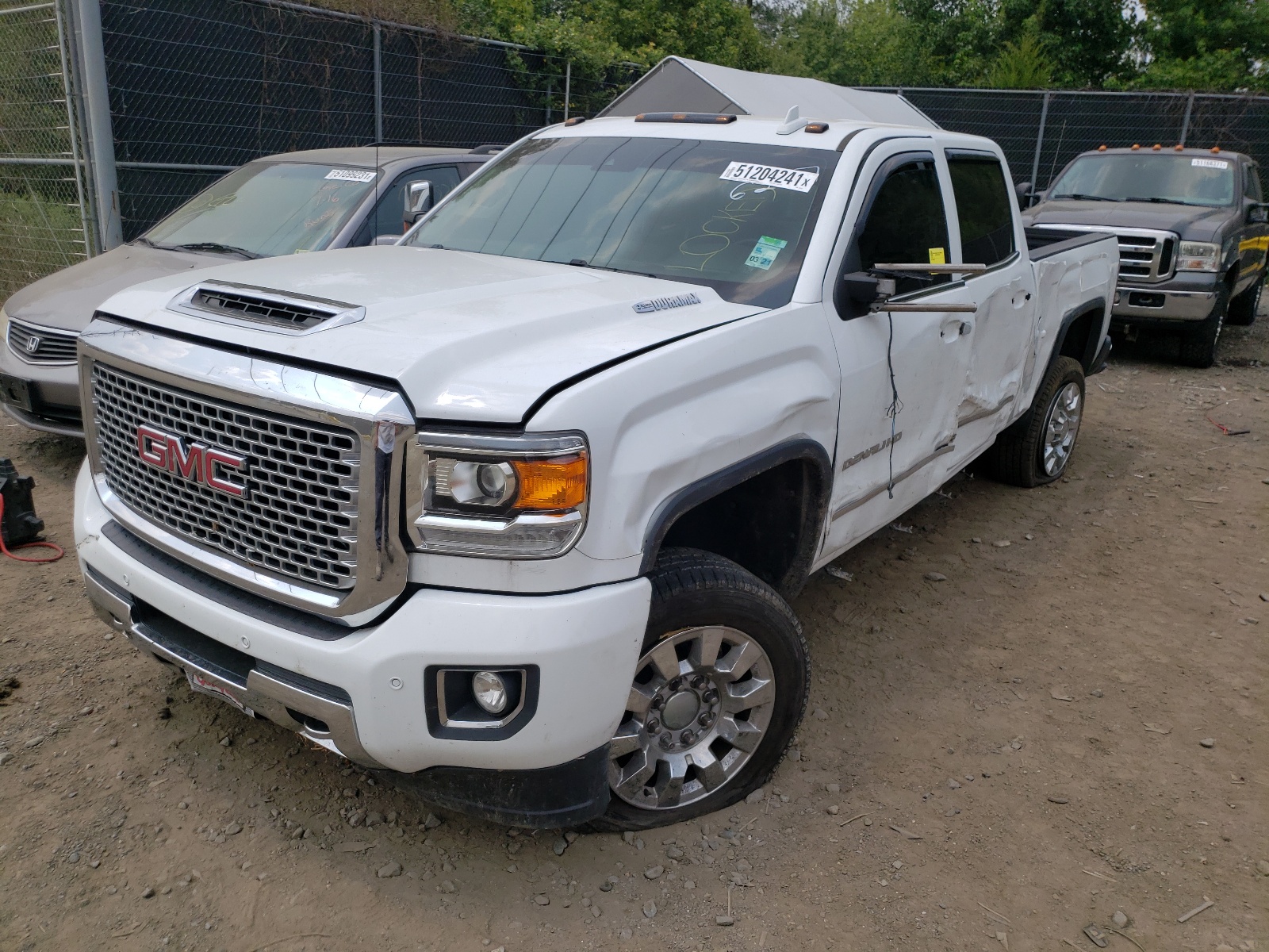 Photo 2 from auction – 2017 GMC SIERRA K25 with VIN 1GT12UEY1HF226237