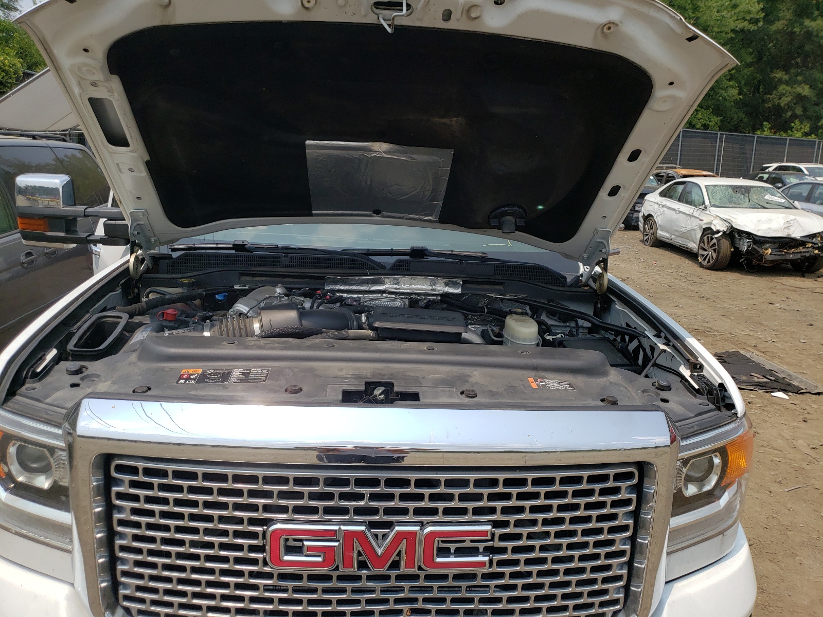 Photo 7 from auction – 2017 GMC SIERRA K25 with VIN 1GT12UEY1HF226237
