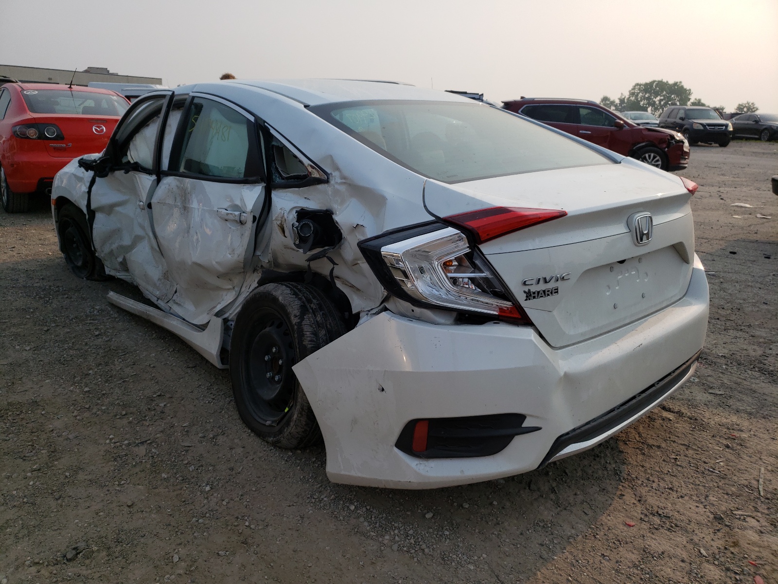 Photo 3 from auction – 2020 HONDA CIVIC LX with VIN 19XFC2F60LE029907