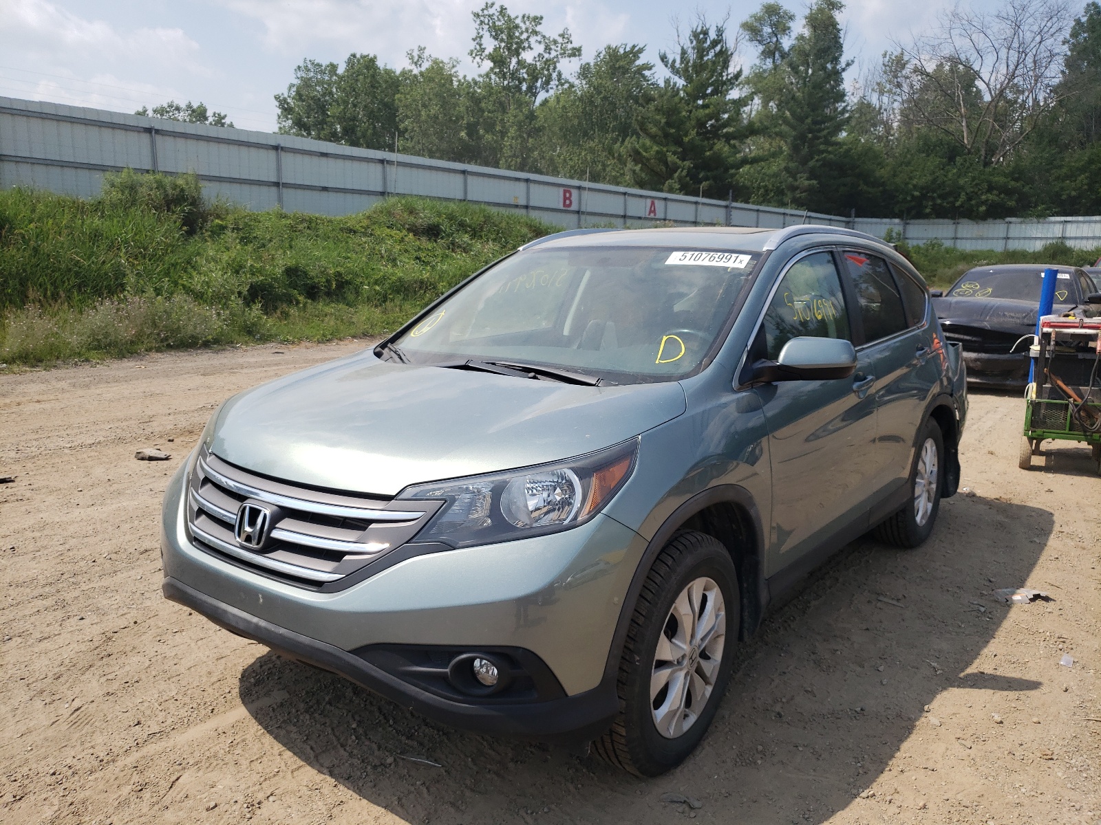 Photo 2 from auction – 2012 HONDA CR-V EXL with VIN 2HKRM4H70CH610086