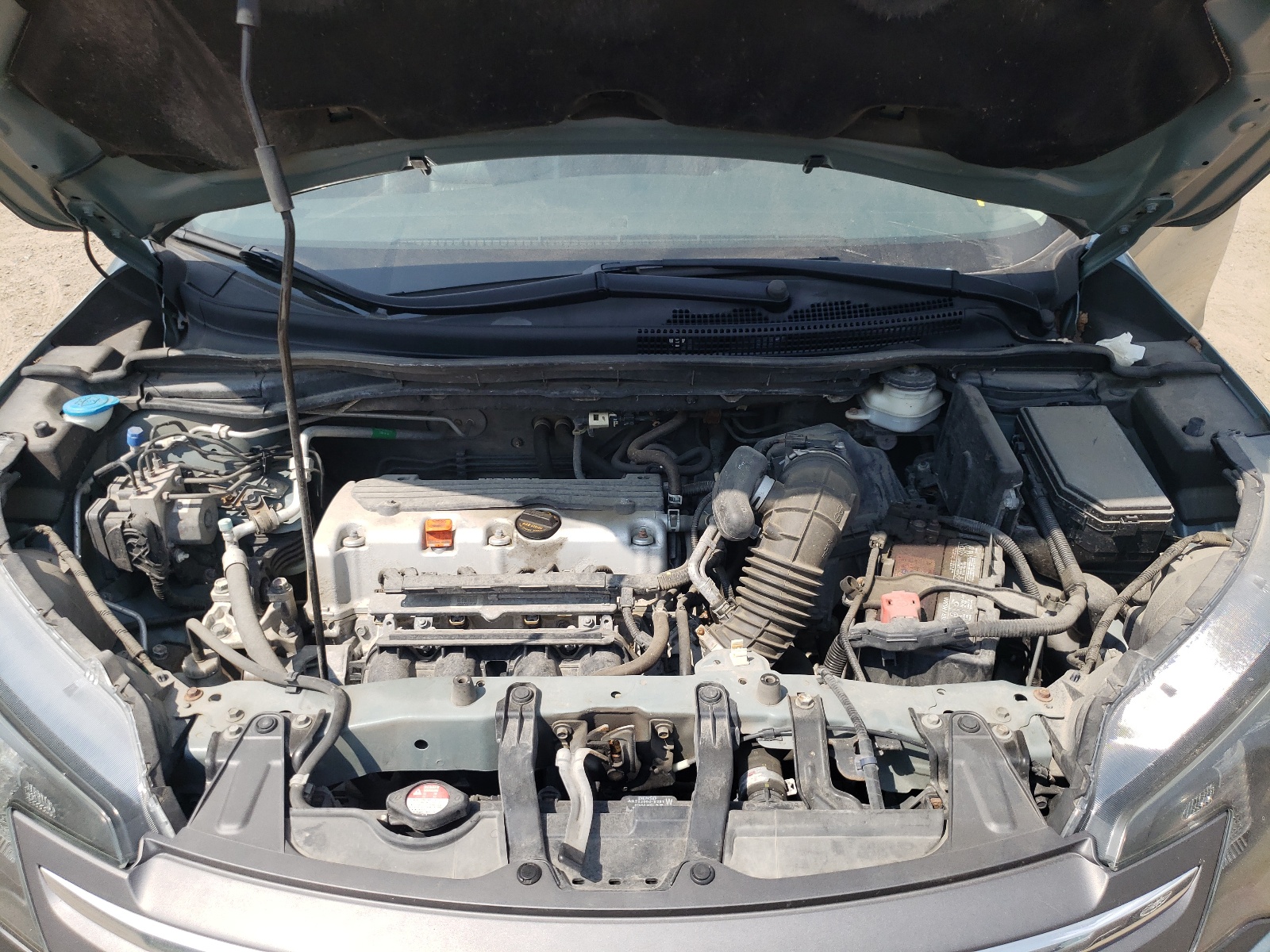 Photo 7 from auction – 2012 HONDA CR-V EXL with VIN 2HKRM4H70CH610086