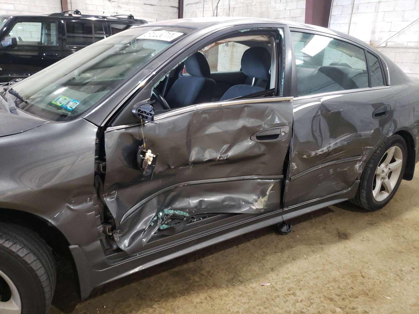 Photo 9 from auction – 2005 NISSAN ALTIMA SE with VIN 1N4BL11E15C956423