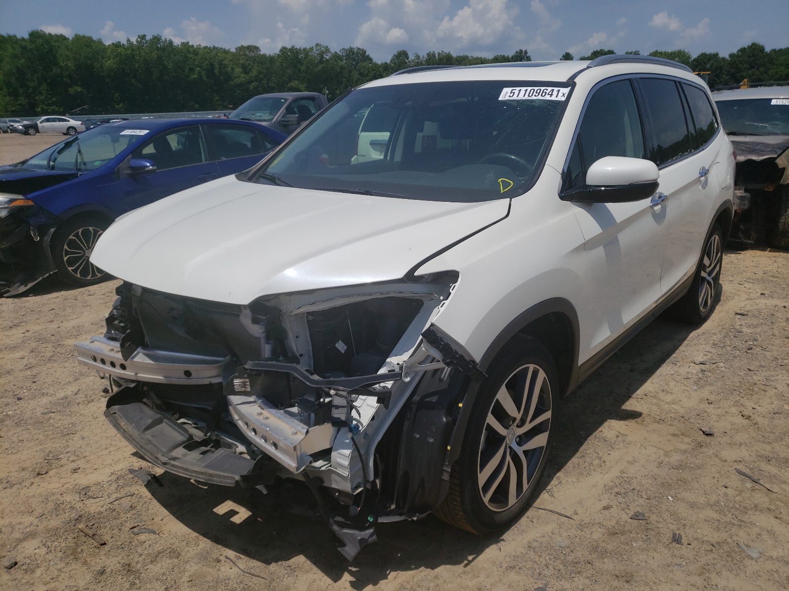 Photo 2 from auction – 2017 HONDA PILOT ELIT with VIN 5FNYF6H01HB045874