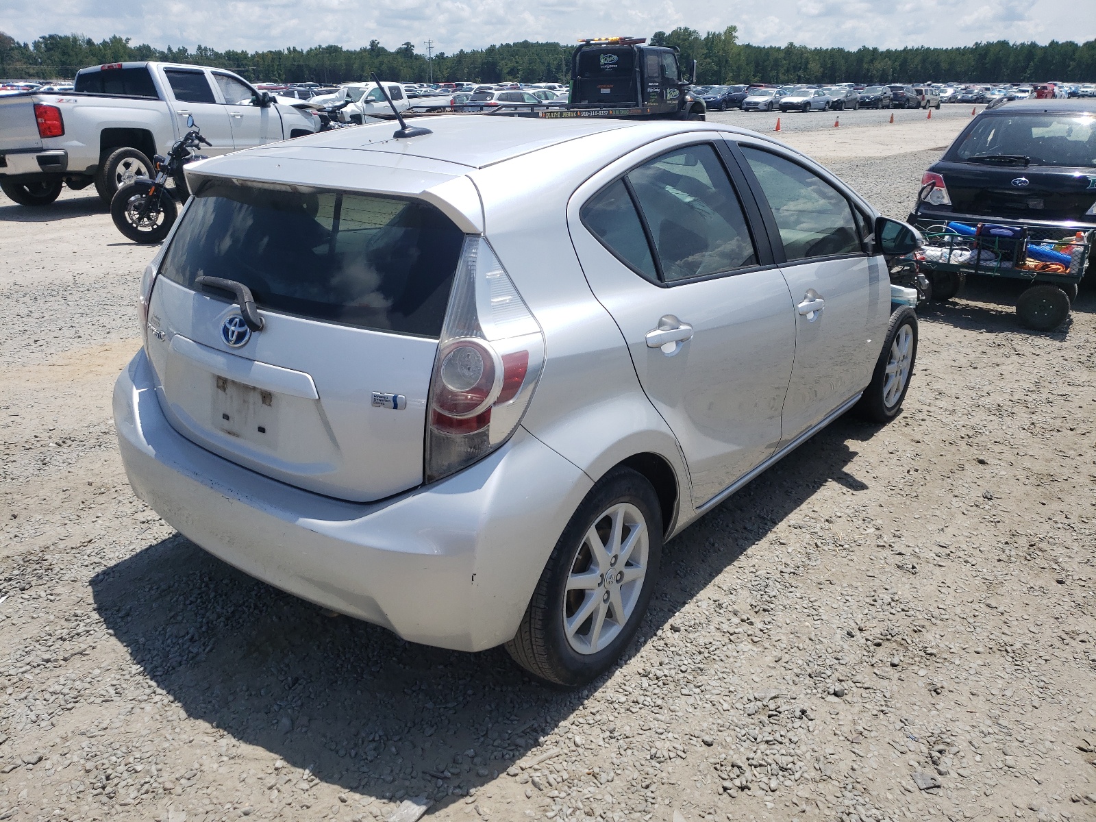 Photo 4 from auction – 2012 TOYOTA PRIUS C with VIN JTDKDTB35C1501860