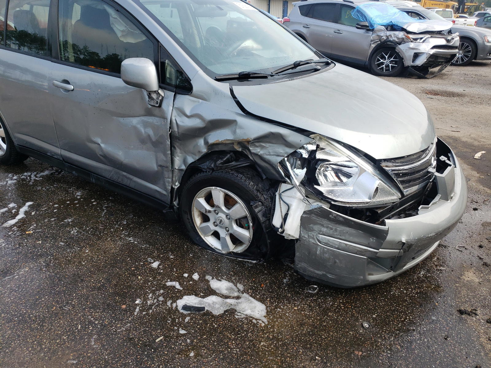 Photo 9 from auction – 2012 NISSAN VERSA S with VIN 3N1BC1CP4CK210244