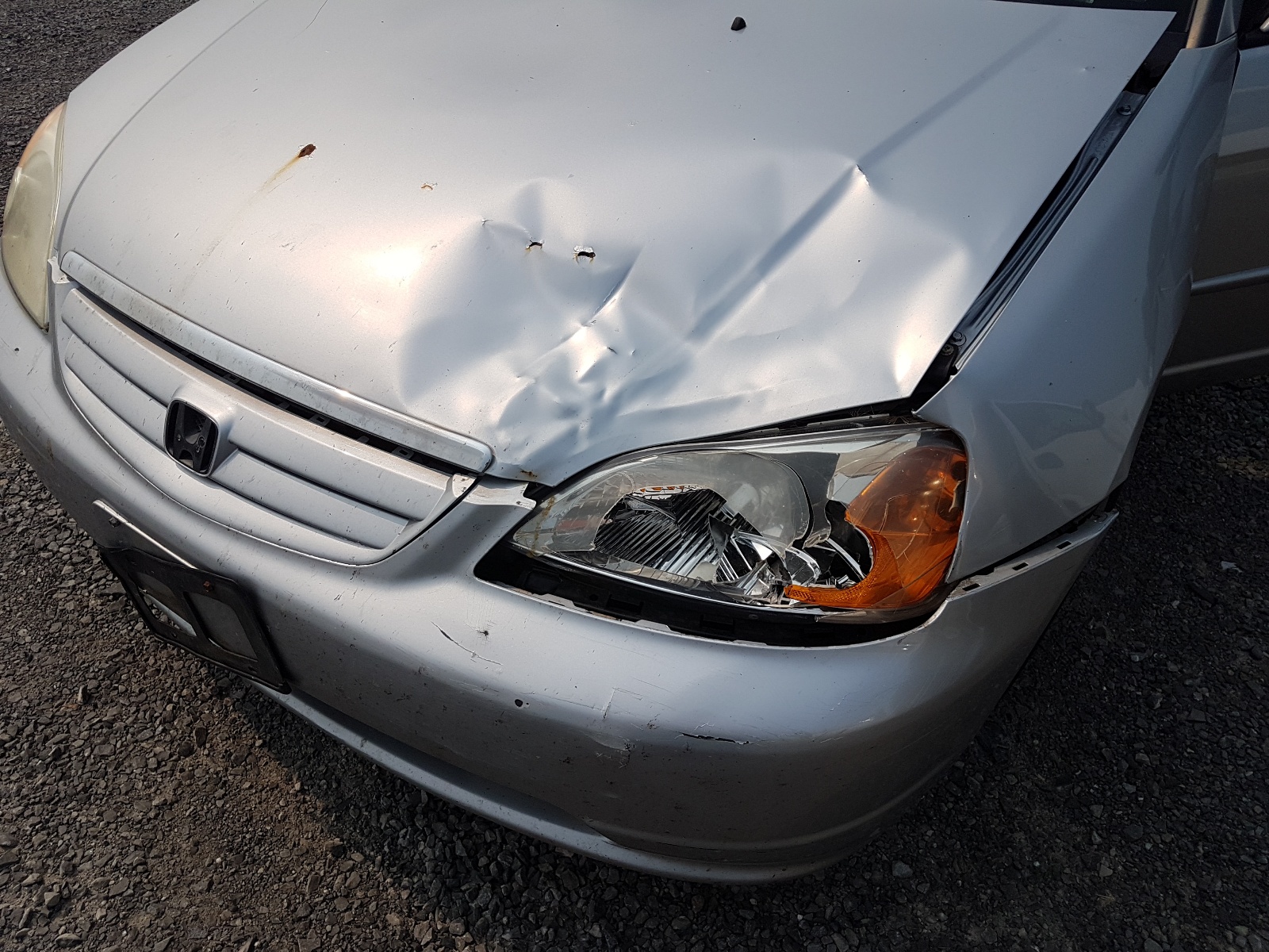 Photo 9 from auction – 2003 HONDA CIVIC LX with VIN 2HGES166X3H923797