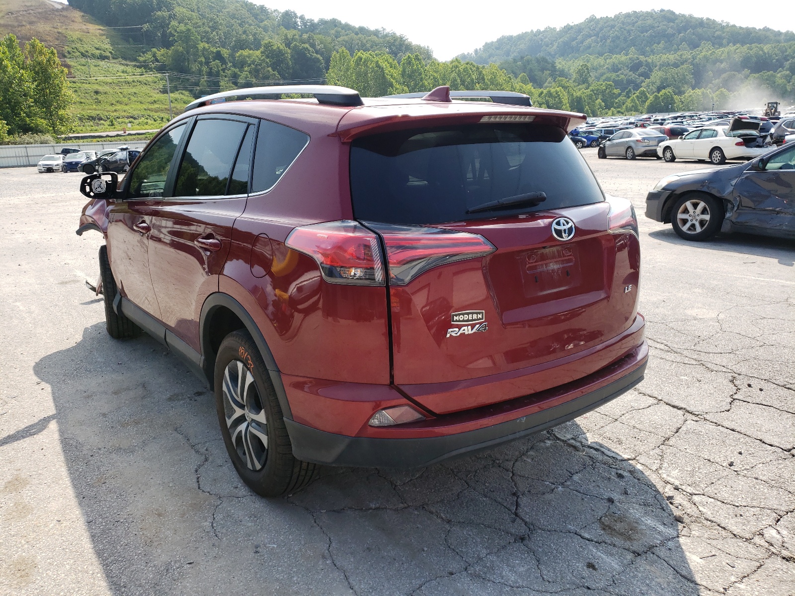 Photo 3 from auction – 2018 TOYOTA RAV4 LE with VIN 2T3ZFREV1JW452857