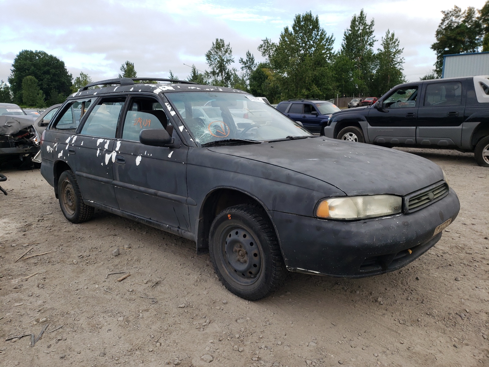 SUBARU LEGACY L 1995 with VIN 4S3BK6355S6348521 - Photo from auction