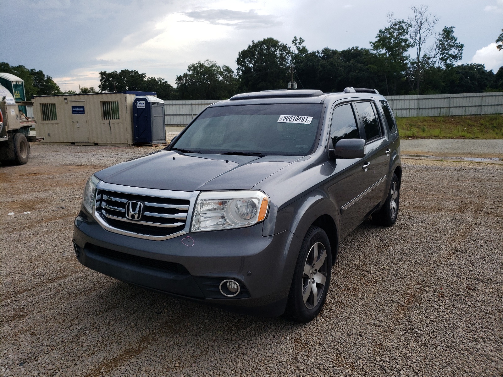 Photo 2 from auction – 2013 HONDA PILOT TOUR with VIN 5FNYF3H93DB004279
