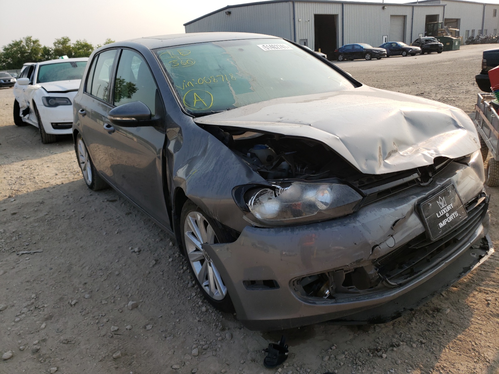 VOLKSWAGEN GOLF 2014 with VIN WVWDM7AJ5EW008718 - Photo from auction