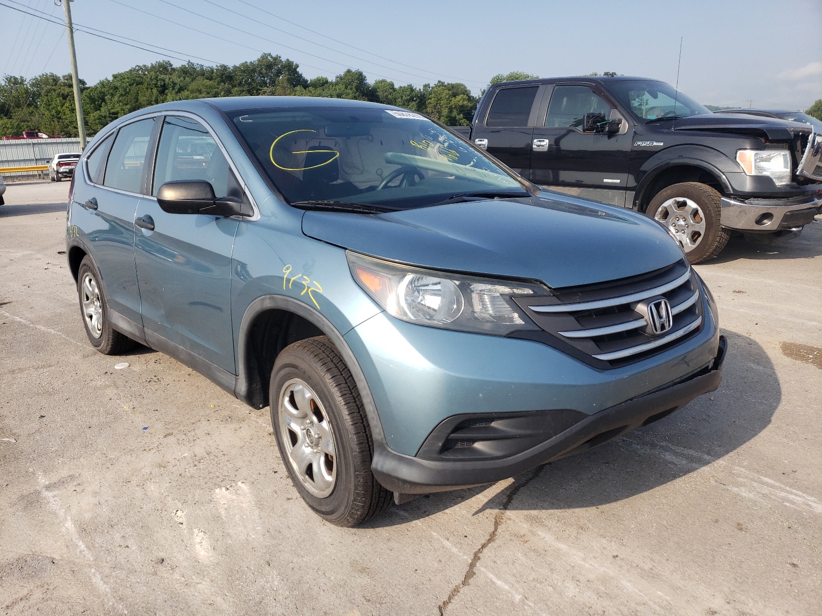 Photo 1 from auction – 2014 HONDA CR-V LX with VIN 2HKRM3H35EH560389
