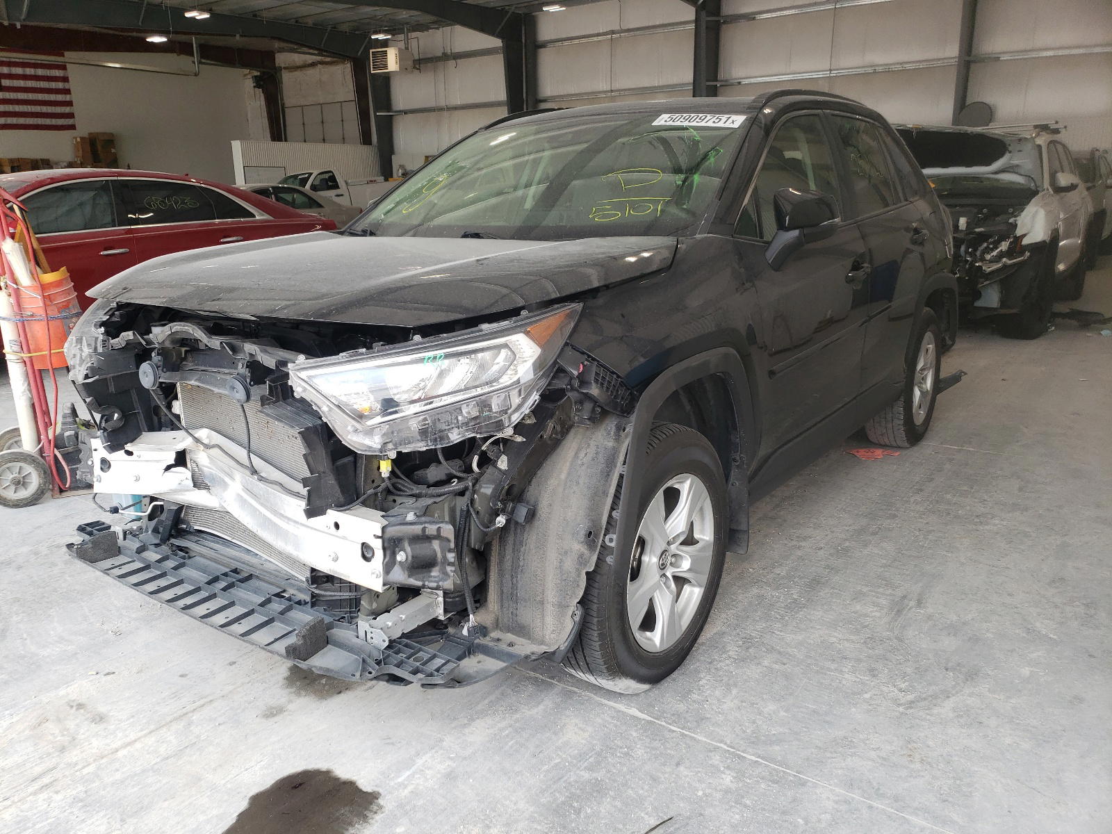 Photo 2 from auction – 2019 TOYOTA RAV4 XLE with VIN JTMP1RFV9KD005101