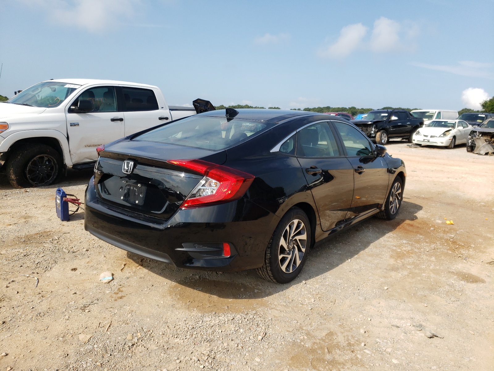 Photo 4 from auction – 2018 HONDA CIVIC EX with VIN 19XFC2F79JE003148