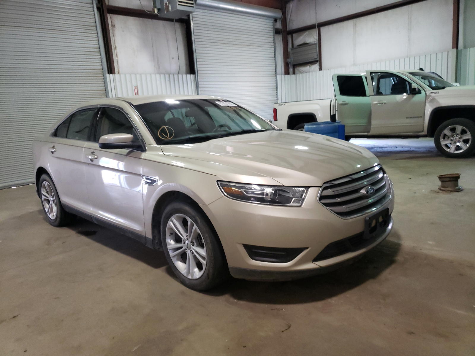 FORD TAURUS SEL 2017 with VIN 1FAHP2E88HG127435 - Photo from auction