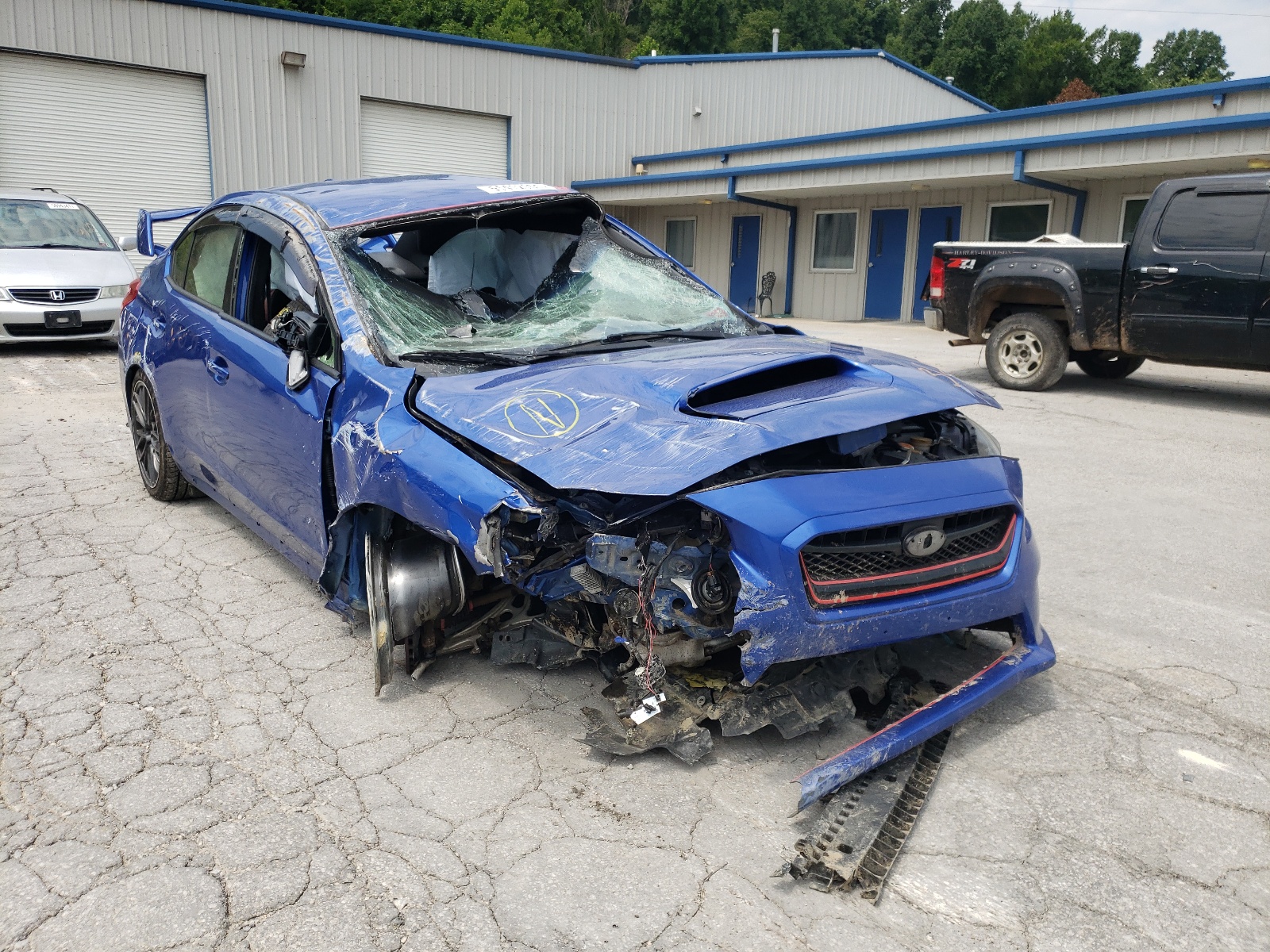 SUBARU WRX STI 2017 with VIN JF1VA2M64H9822679 - Photo from auction