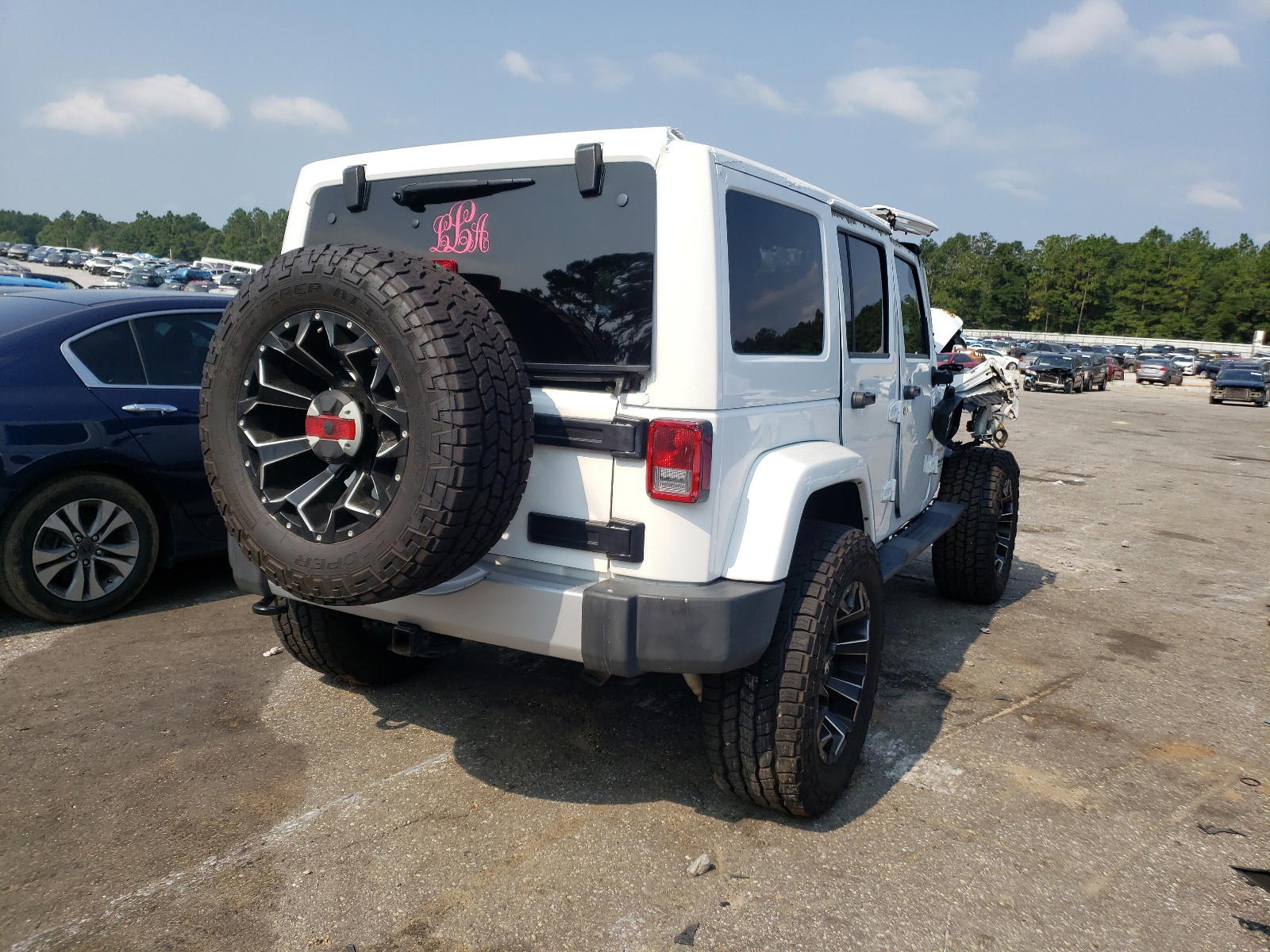 Photo 4 from auction – 2015 JEEP WRANGLER U with VIN 1C4BJWEG5FL644101