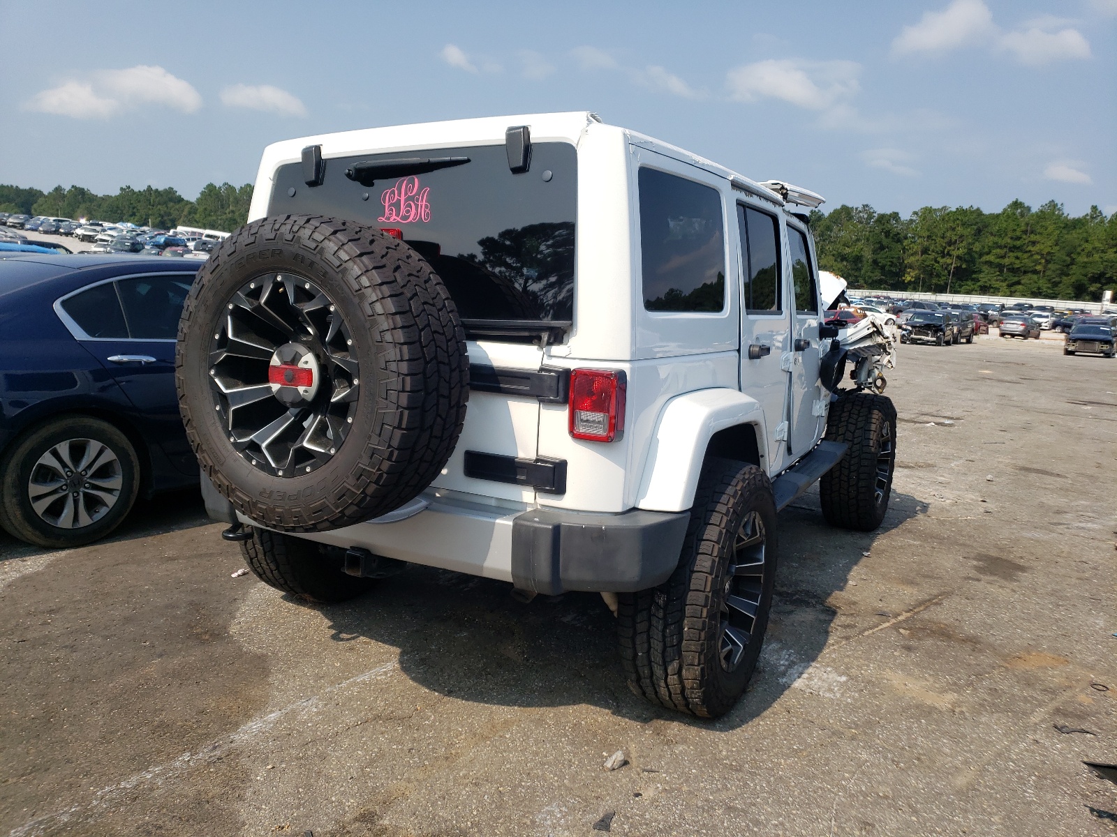 Foto 4 de la subasta – 2015 JEEP WRANGLER U con VIN 1C4BJWEG5FL644101