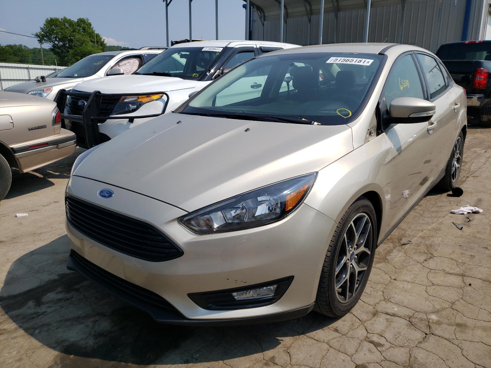 Photo 2 from auction – 2017 FORD FOCUS SE with VIN 1FADP3FE0HL292363