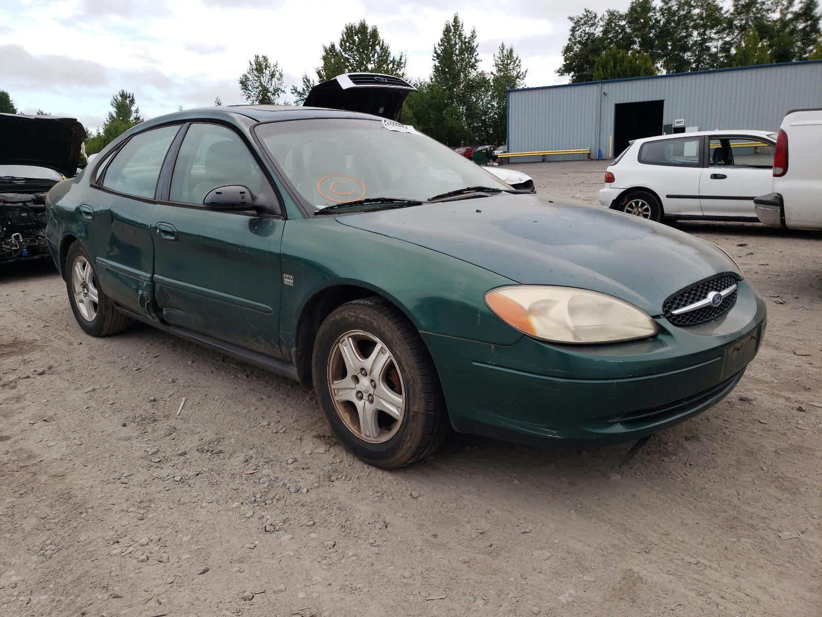 FORD TAURUS 2000 with VIN 1FAFP56S3YA125162 - Photo from auction