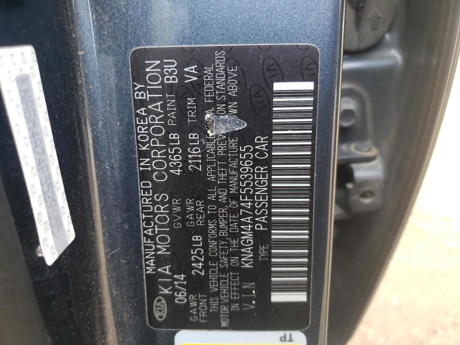 Photo 10 from auction – 2015 KIA OPTIMA LX with VIN KNAGM4A74F5539655