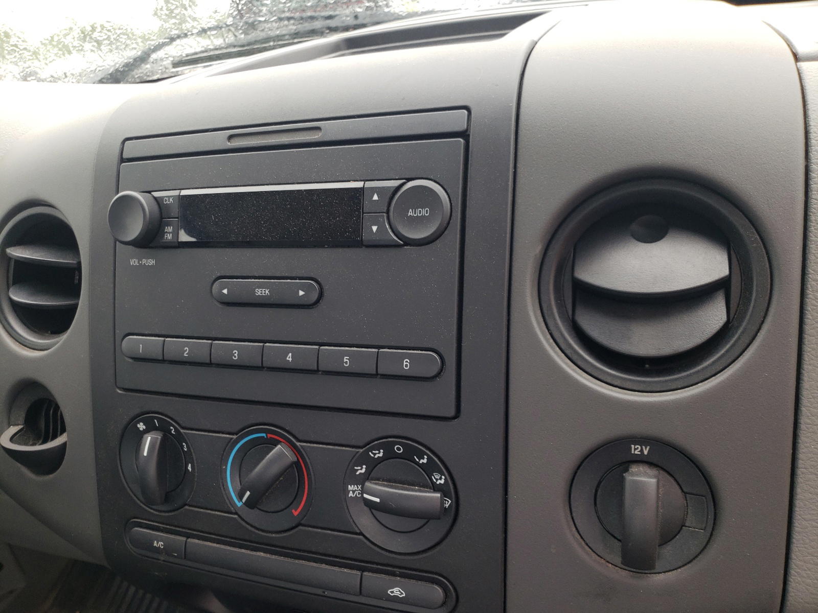 Photo 9 from auction – 2007 FORD F150 with VIN 1FTRF12227NA71093