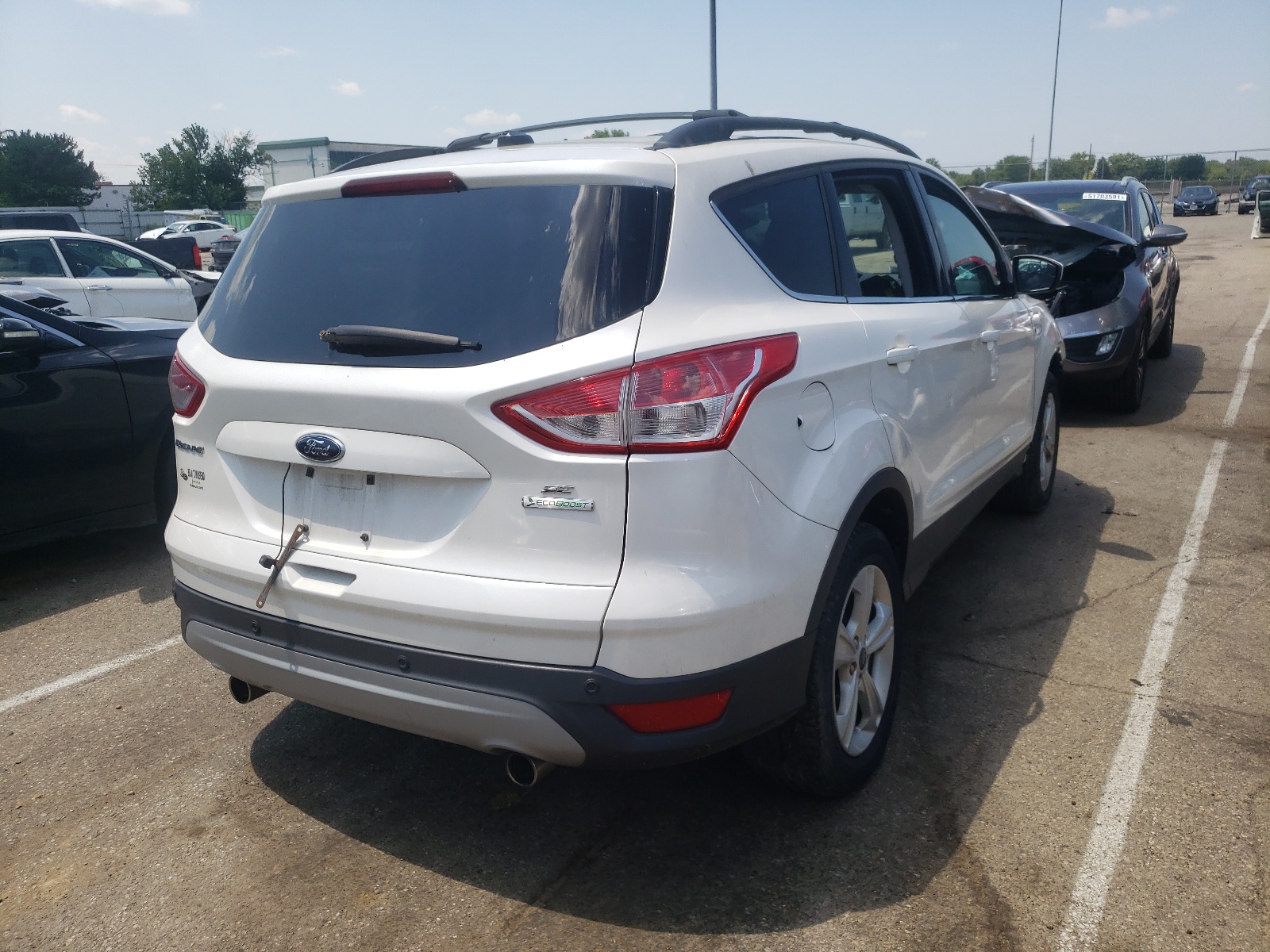 Photo 4 from auction – 2013 FORD ESCAPE SE with VIN 1FMCU0GX0DUB93314