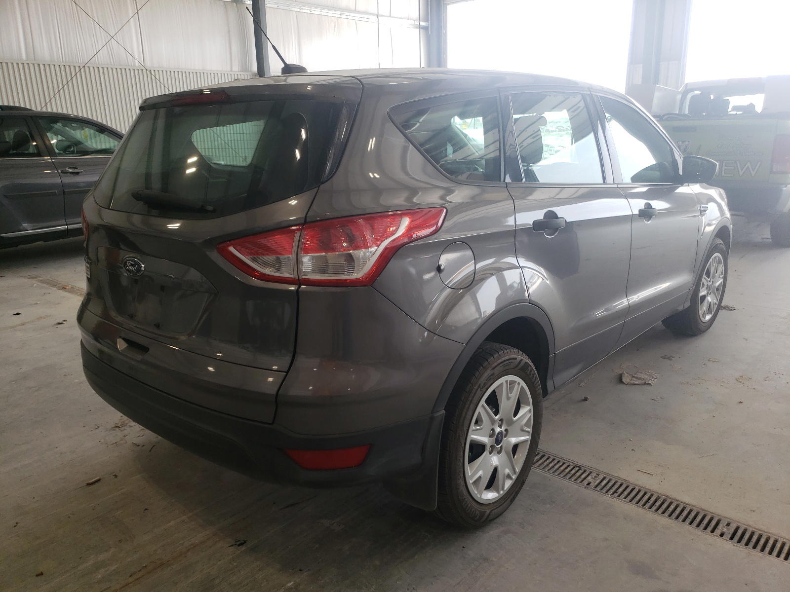 Photo 4 from auction – 2013 FORD ESCAPE S with VIN 1FMCU0F71DUA93434