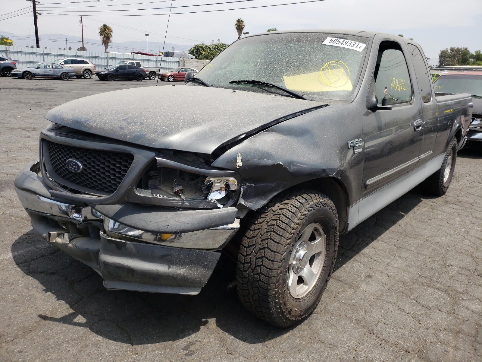 Photo 2 from auction – 2002 FORD F150 with VIN 1FTRX17W12NA93314
