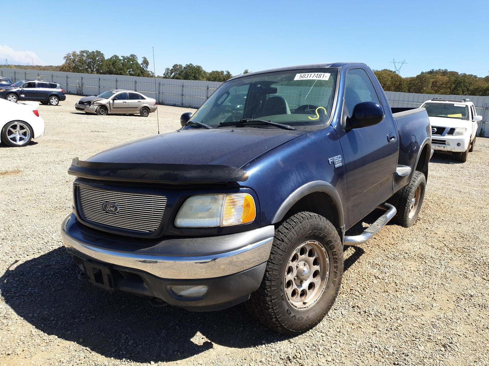 Photo 2 from auction – 2003 FORD F150 with VIN 1FTRF08L03KC00373