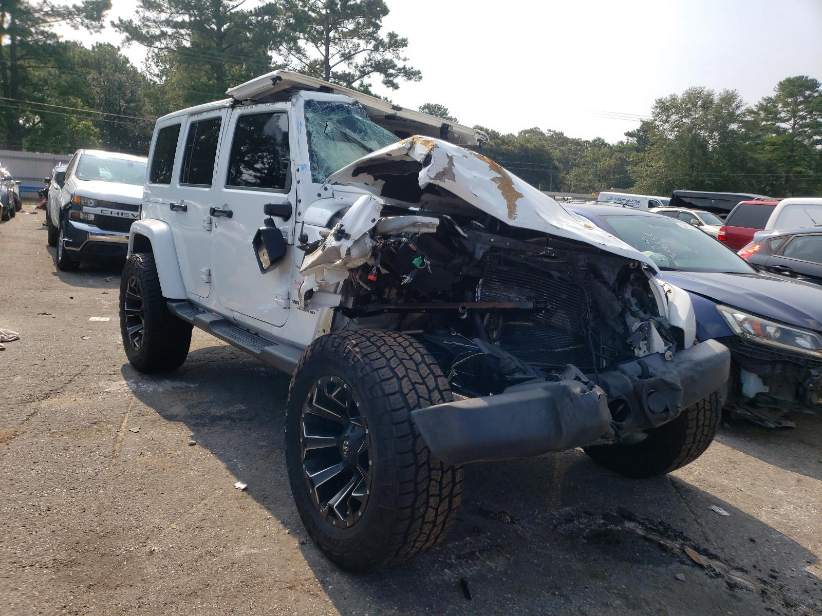 JEEP WRANGLER U 2015 with VIN 1C4BJWEG5FL644101 - Photo from auction