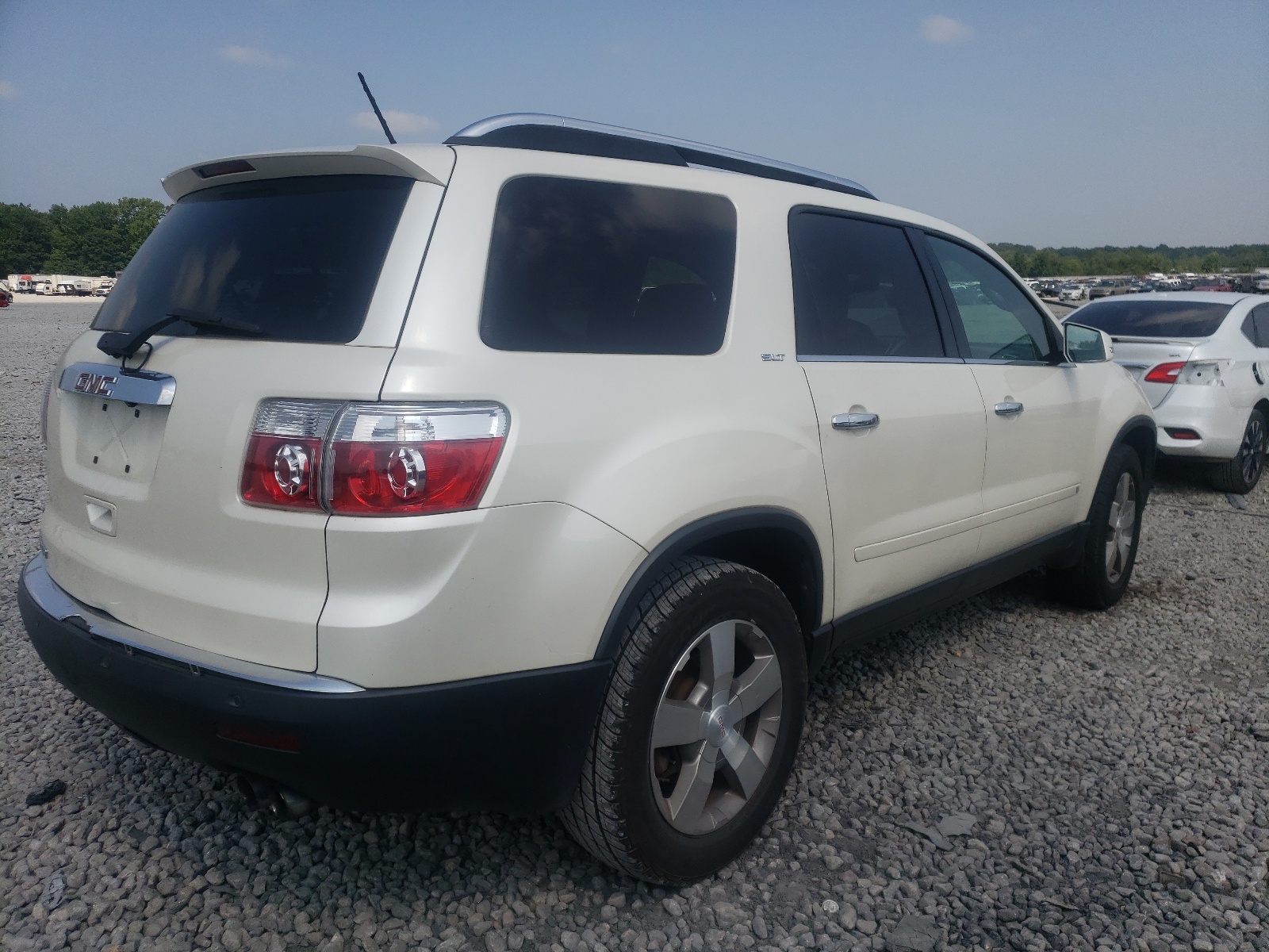 Photo 4 from auction – 2010 GMC ACADIA SLT with VIN 1GKLRMED9AJ100281