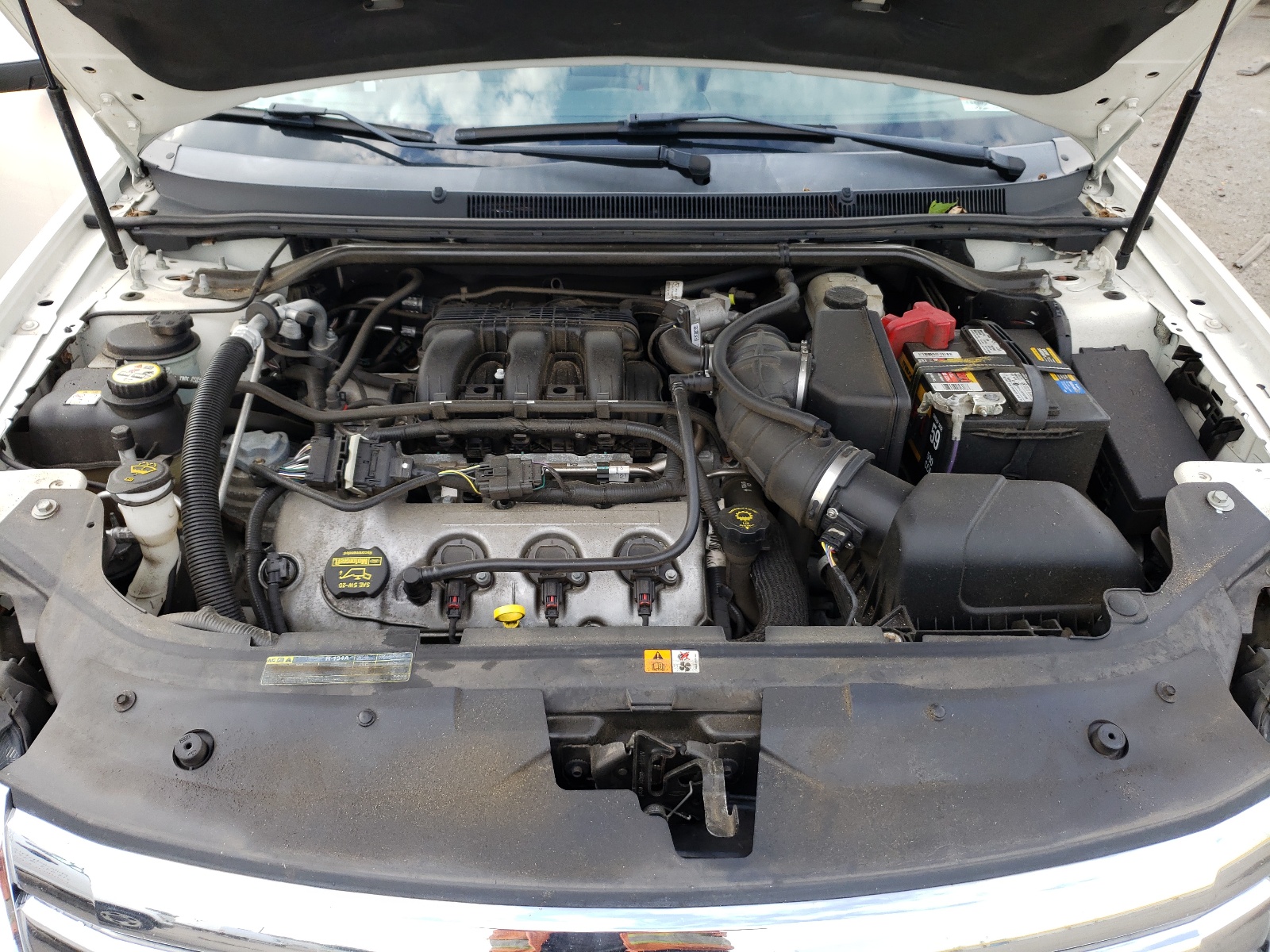 Photo 7 from auction – 2009 FORD TAURUS SE with VIN 1FAHP23W69G106098
