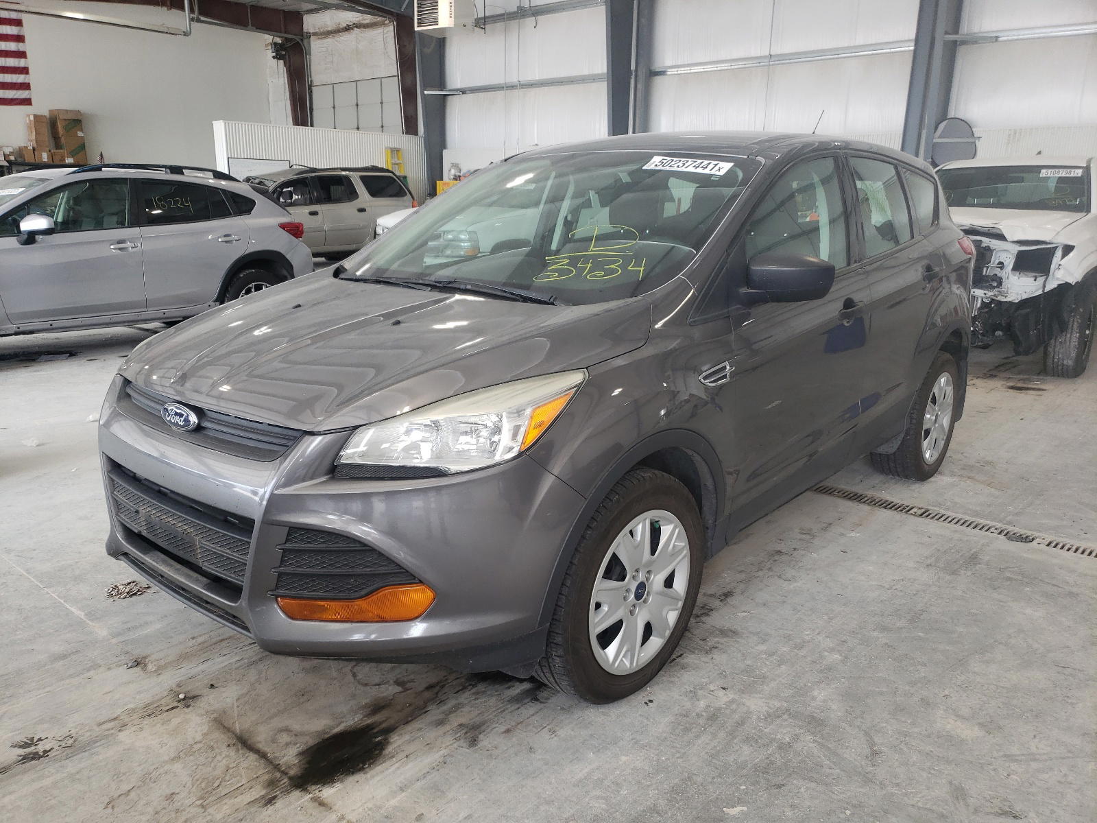 Photo 2 from auction – 2013 FORD ESCAPE S with VIN 1FMCU0F71DUA93434