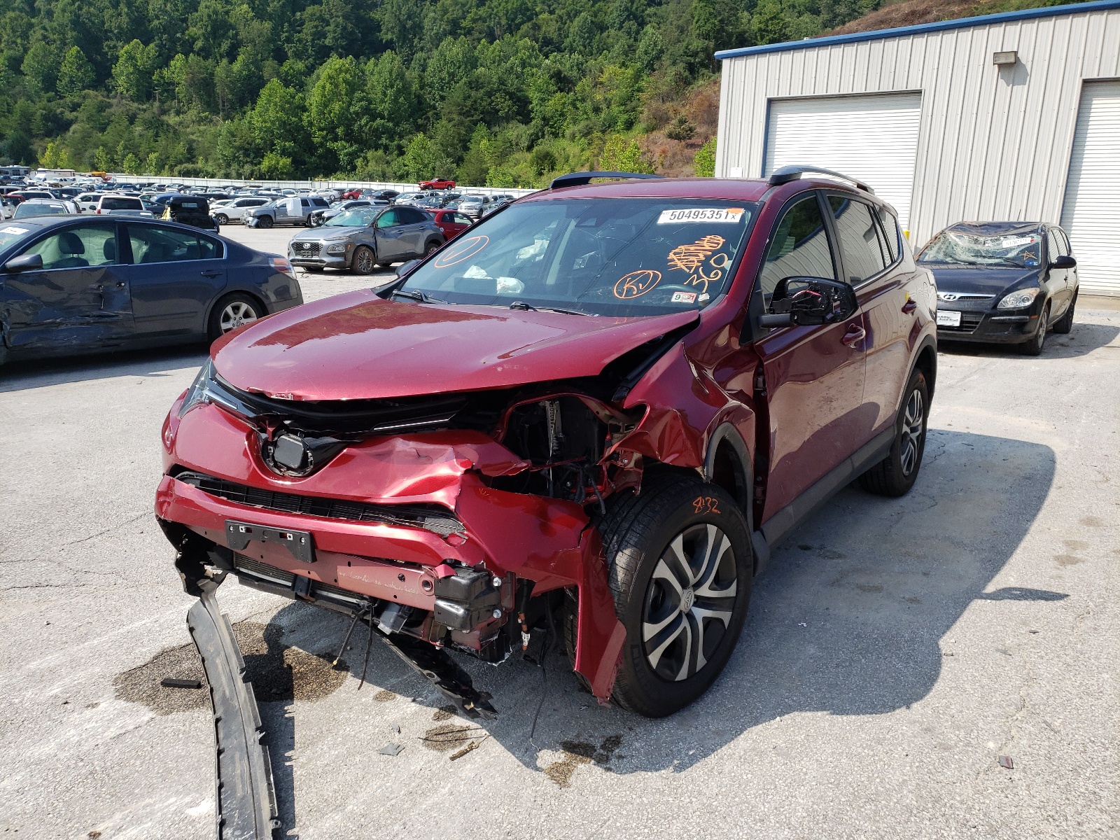 Photo 2 from auction – 2018 TOYOTA RAV4 LE with VIN 2T3ZFREV1JW452857