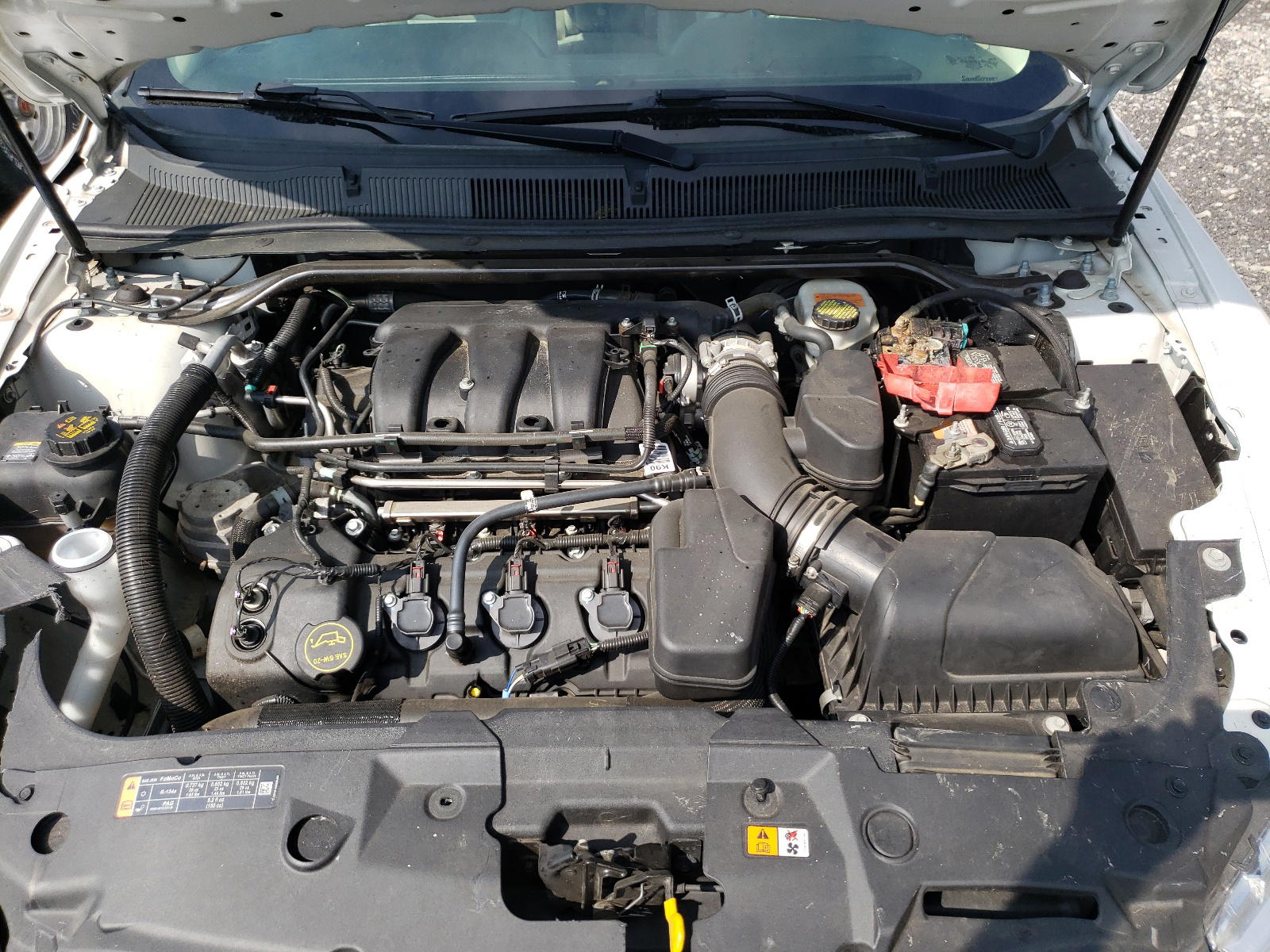 Photo 7 from auction – 2015 FORD TAURUS SE with VIN 1FAHP2D83FG122724