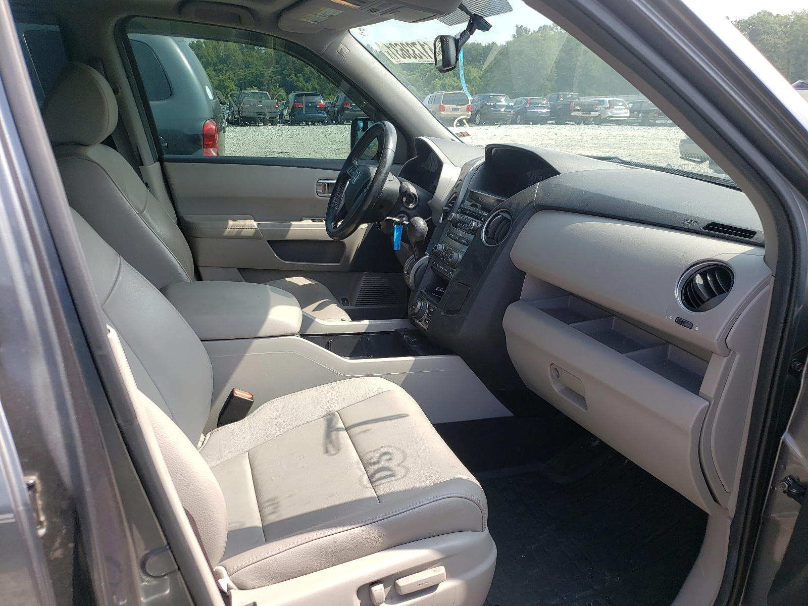 Photo 5 from auction – 2013 HONDA PILOT EXLN with VIN 5FNYF3H71DB026652