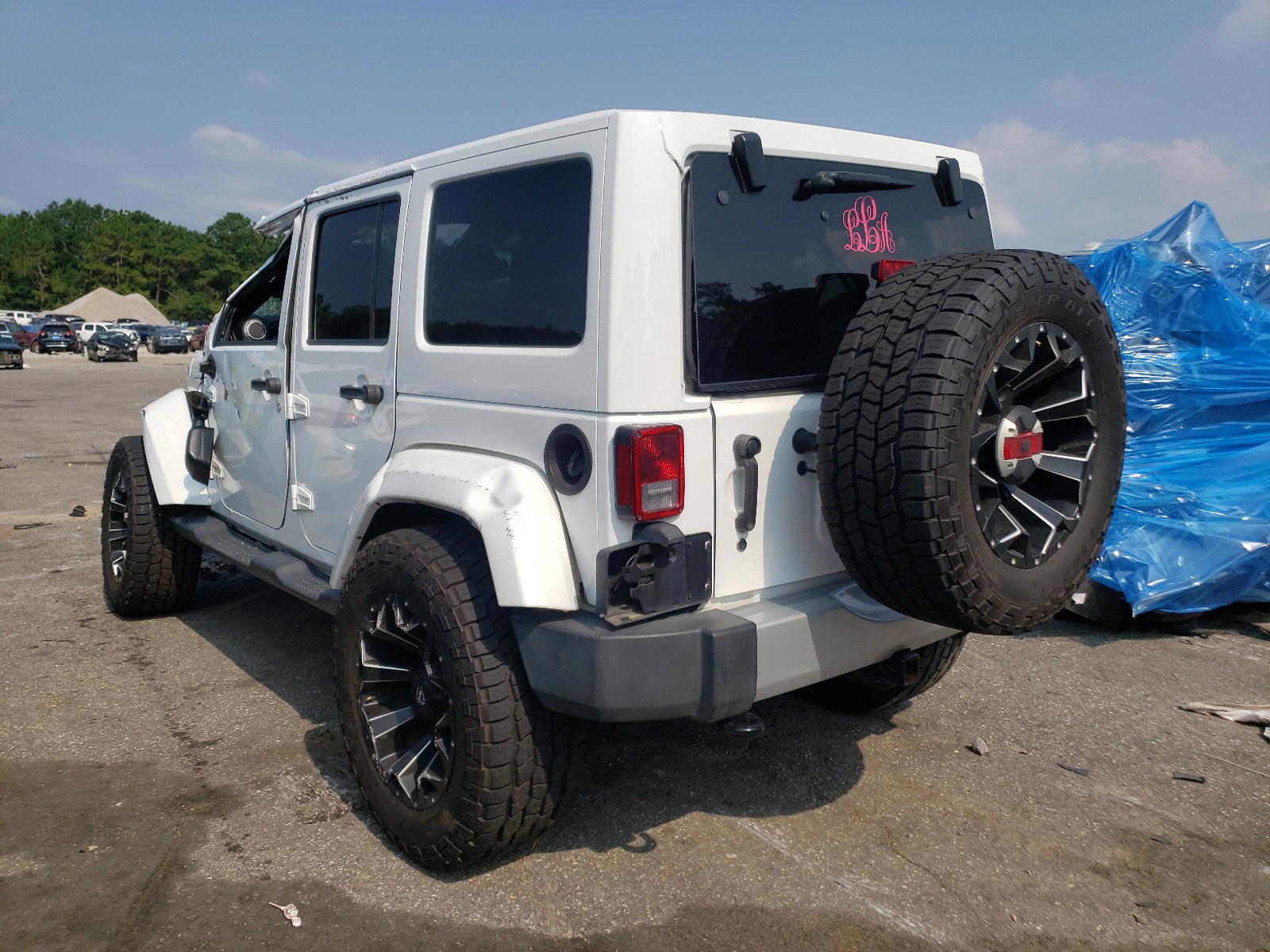 Photo 3 from auction – 2015 JEEP WRANGLER U with VIN 1C4BJWEG5FL644101