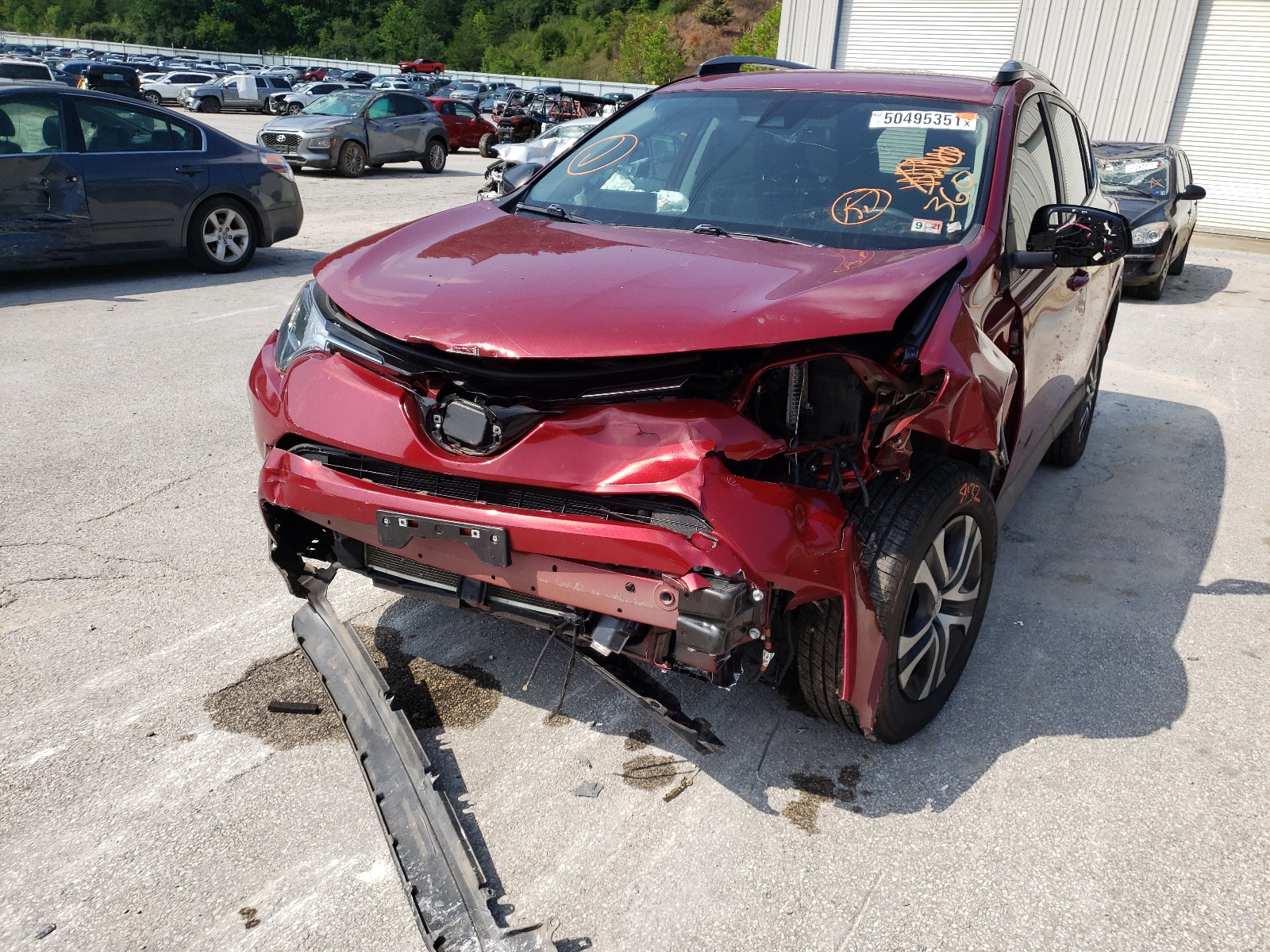 Photo 9 from auction – 2018 TOYOTA RAV4 LE with VIN 2T3ZFREV1JW452857