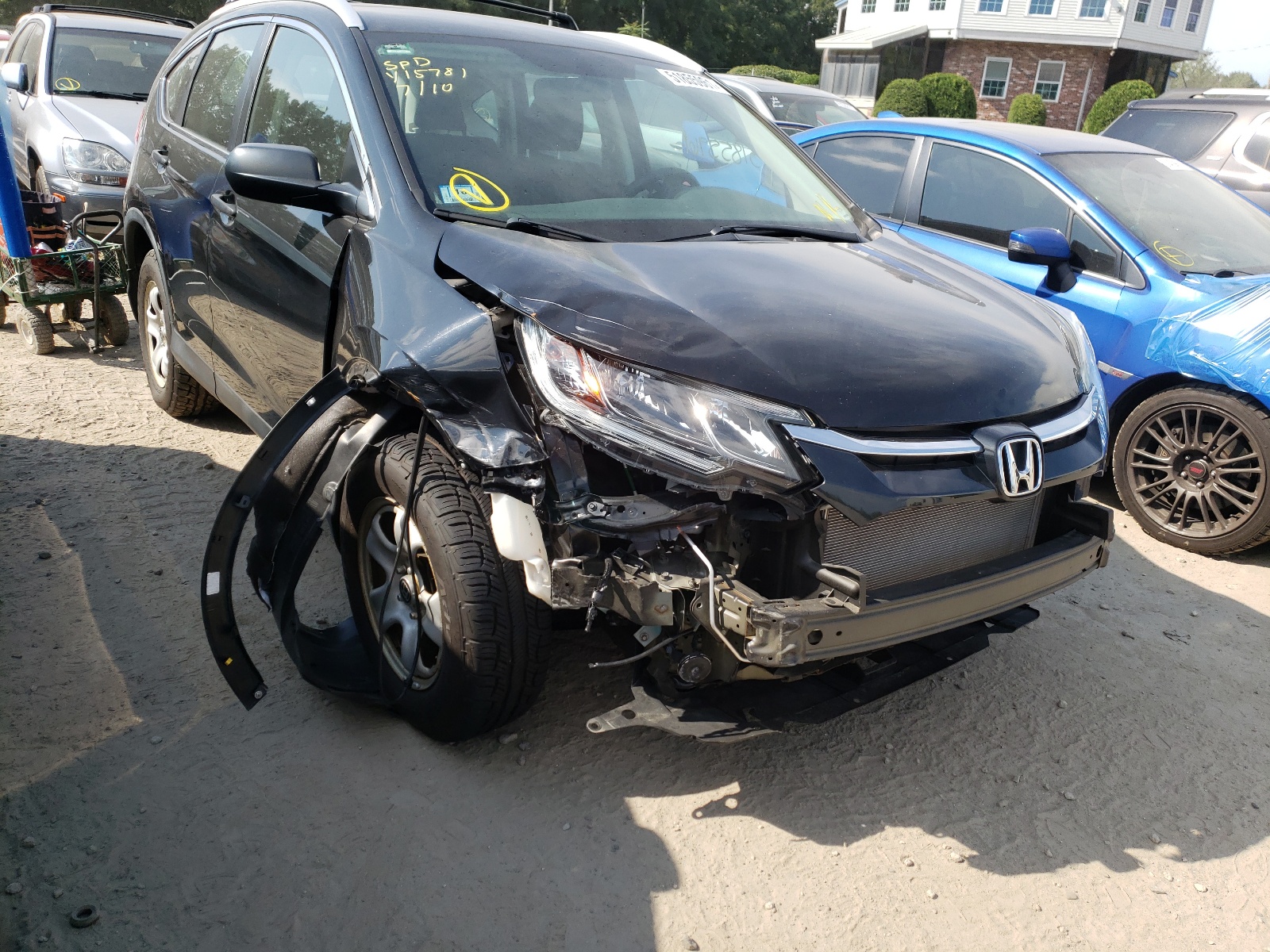 Photo 9 from auction – 2016 HONDA CR-V LX with VIN 5J6RM4H33GL087042