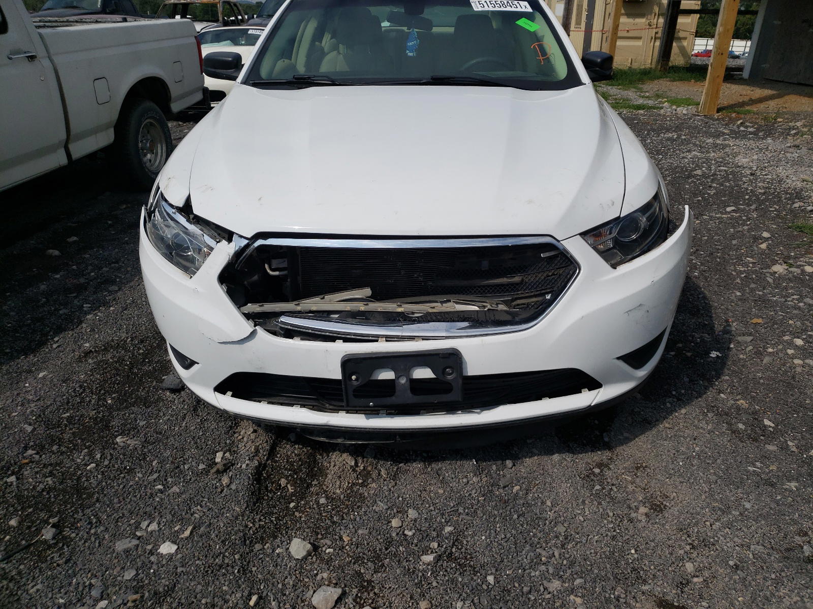 Photo 9 from auction – 2015 FORD TAURUS SE with VIN 1FAHP2D83FG122724