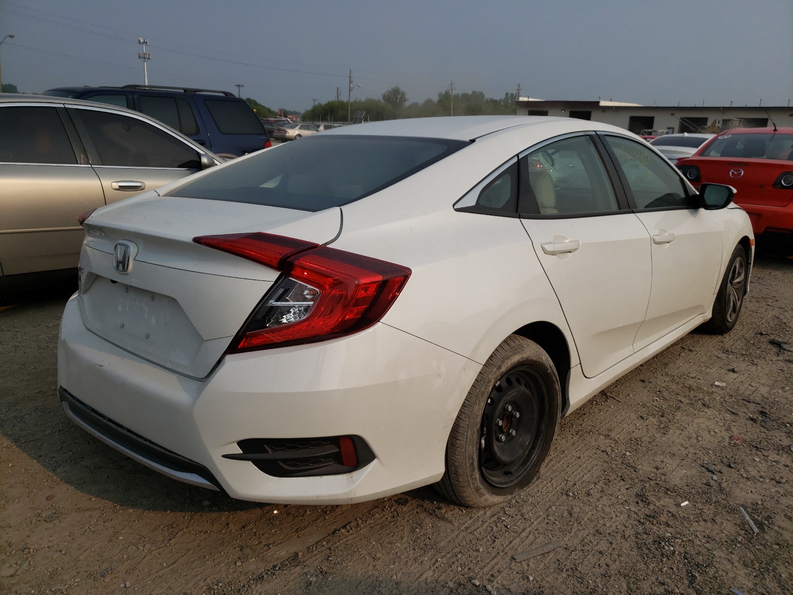 Photo 4 from auction – 2020 HONDA CIVIC LX with VIN 19XFC2F60LE029907